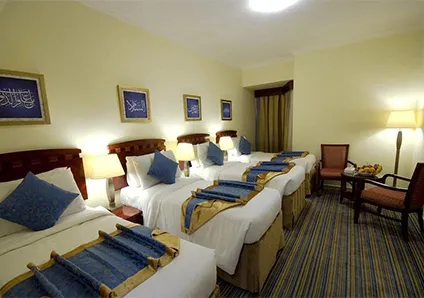 4 single beds room