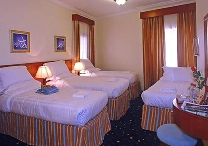 Room with 4 single beds