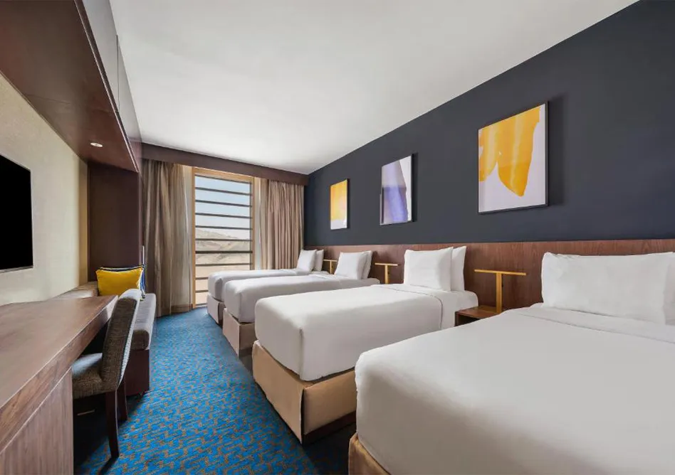 4 single beds room