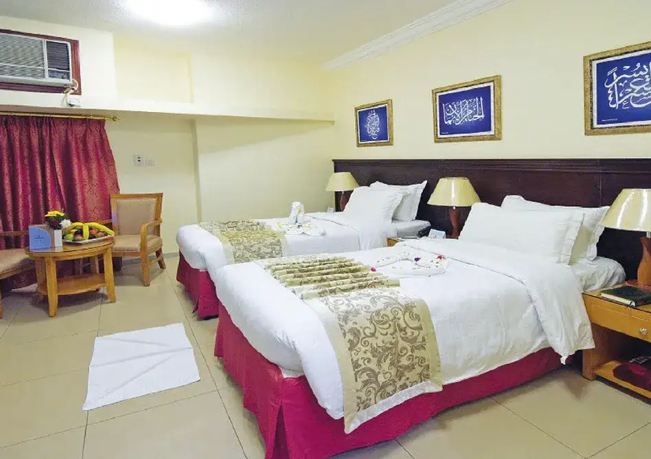 /media/umrah-images/2-single-beds%20%284%29.webp