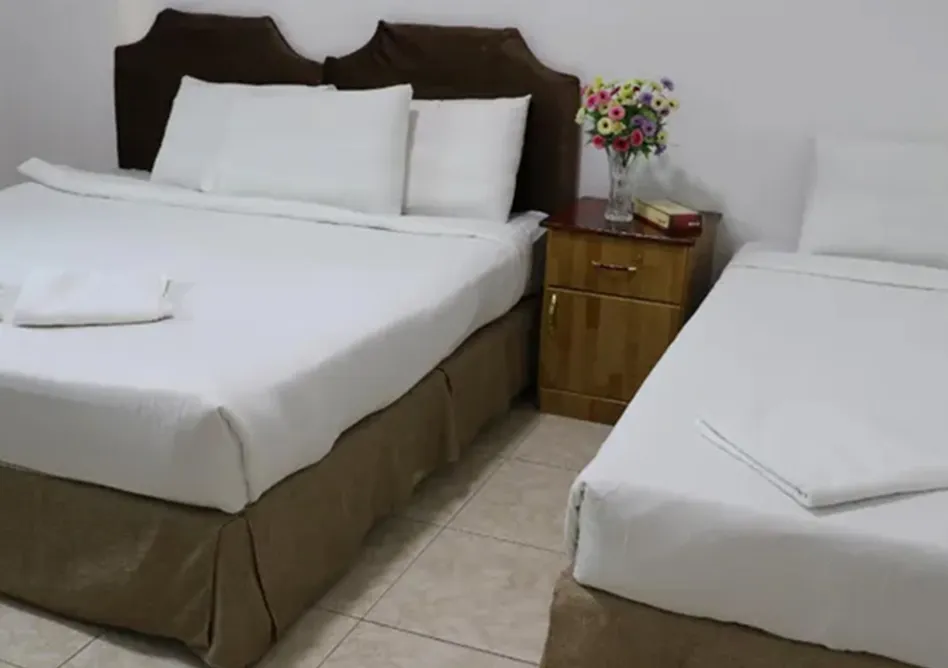 /media/umrah-images/bed-room.webp