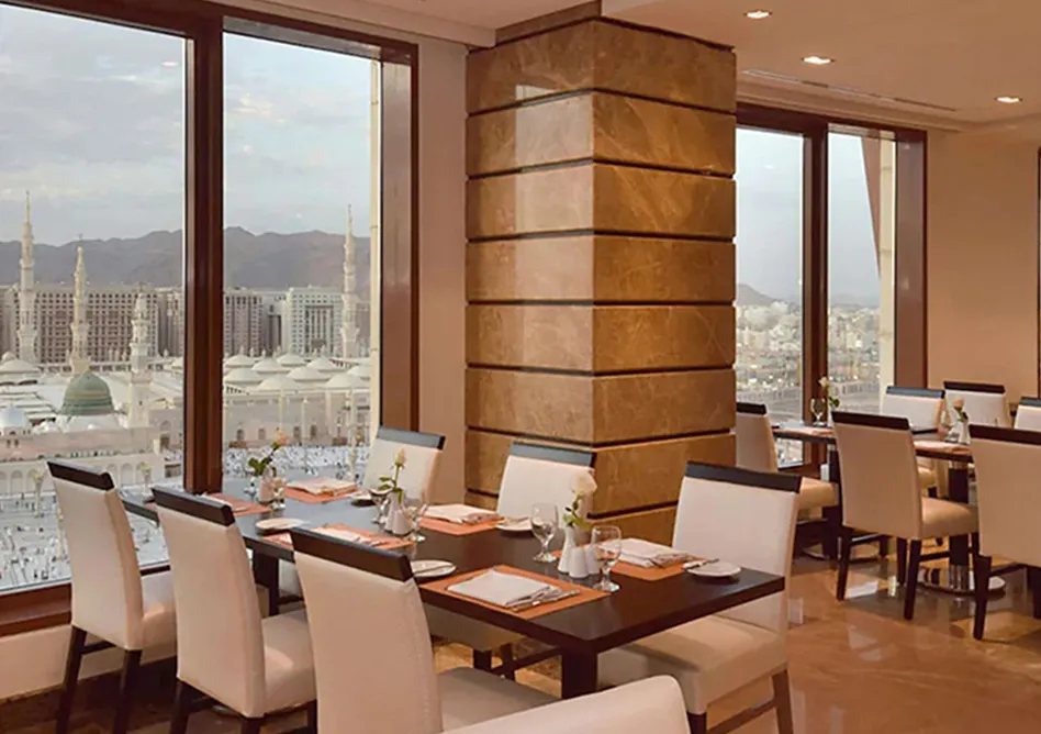 /media/umrah-images/hotel-dining-area.webp