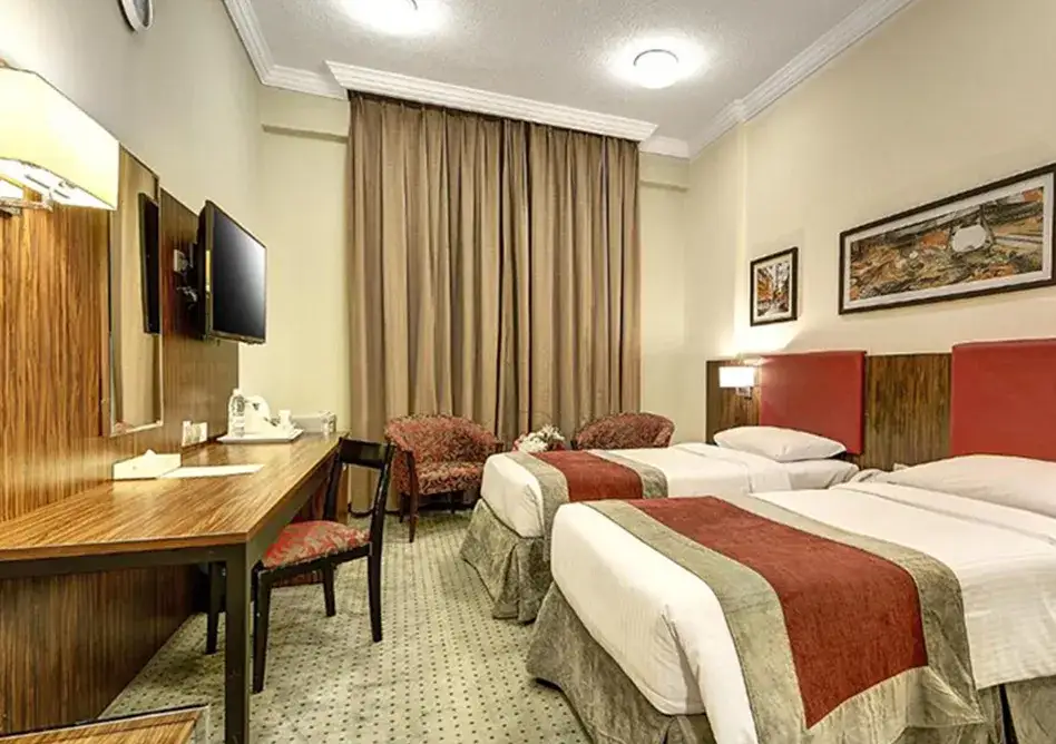 /media/umrah-images/hotel-room-area.webp