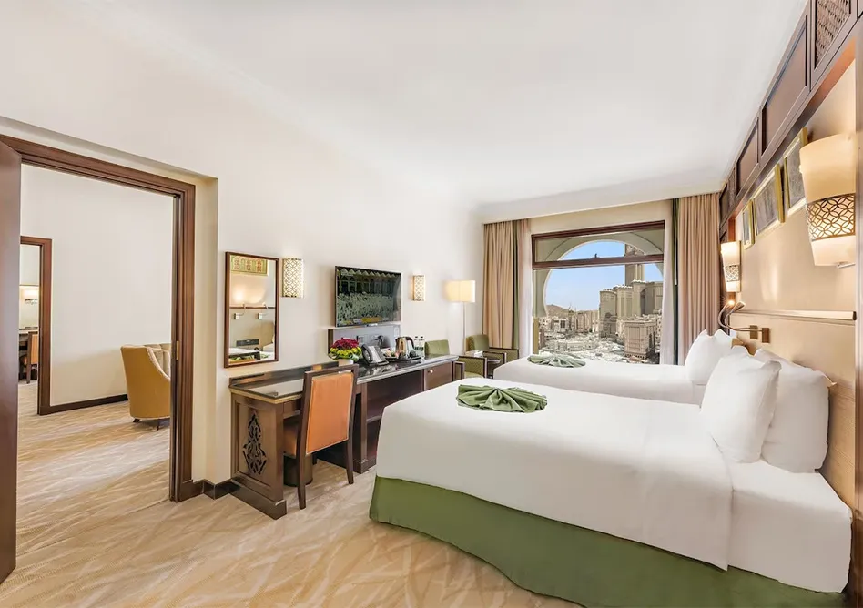 /media/umrah-images/hotel-room-with-2-single-beds.webp