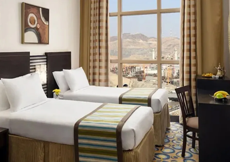 /media/umrah-images/room-with-2-single-bed%20%281%29.webp